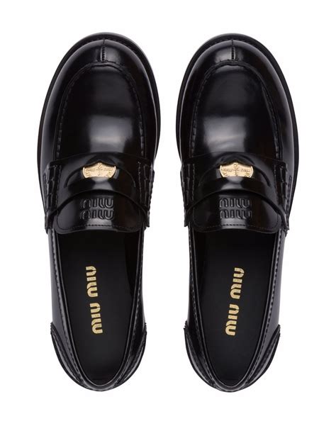 miumiu loafers for women.